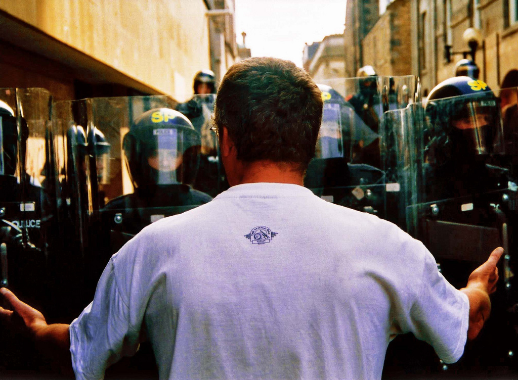 A protester in front of riot police, July 6th 2005.